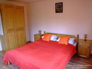 Tempat tidur dalam kamar di Casa Andrei Vatra Dornei
