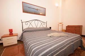 Posteľ alebo postele v izbe v ubytovaní Perdiana House