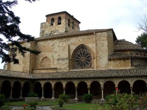 a building with a clock tower on top of it at Hotel Yerri in Estella