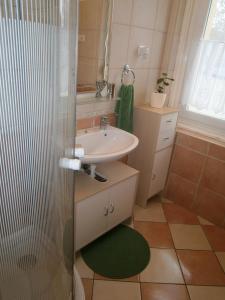 Koupelna v ubytování ÁRPÁD Apartman