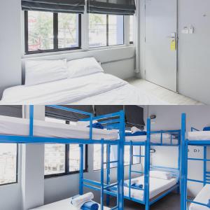 2 literas en una habitación en Loftel Station Hostel, en Bangkok