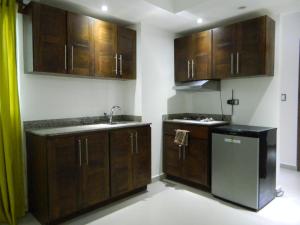 Η κουζίνα ή μικρή κουζίνα στο Figaro Hotel Samana
