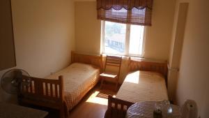 Ένα ή περισσότερα κρεβάτια σε δωμάτιο στο Armenia Hostel