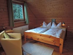 Ein Bett oder Betten in einem Zimmer der Unterkunft ****FH Blauvogel 60 Harz