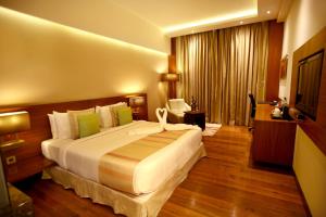 Ένα ή περισσότερα κρεβάτια σε δωμάτιο στο Park Ascent