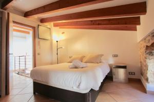 A bed or beds in a room at Eu Forat