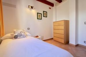 A bed or beds in a room at Eu Forat