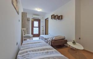 Postel nebo postele na pokoji v ubytování Apartments Monte Grande