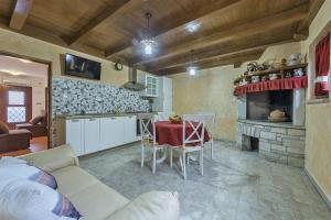Kuchyň nebo kuchyňský kout v ubytování Apartments Monte Grande