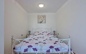 Postel nebo postele na pokoji v ubytování Apartments Monte Grande