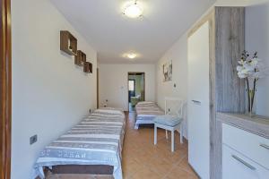 Postel nebo postele na pokoji v ubytování Apartments Monte Grande