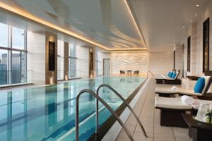 a swimming pool in a hotel room with a view at Shangri-La Tokyo in Tokyo
