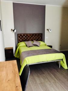Postel nebo postele na pokoji v ubytování Pove 2.4 Hotel