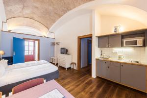 Posteľ alebo postele v izbe v ubytovaní HolidayPark Mlázovy