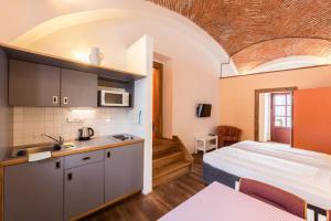 Posteľ alebo postele v izbe v ubytovaní HolidayPark Mlázovy