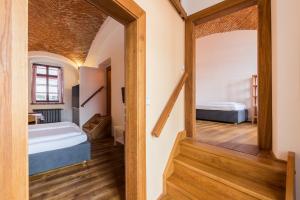 Posteľ alebo postele v izbe v ubytovaní HolidayPark Mlázovy