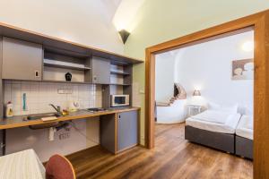 Posteľ alebo postele v izbe v ubytovaní HolidayPark Mlázovy