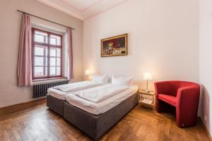 Posteľ alebo postele v izbe v ubytovaní HolidayPark Mlázovy