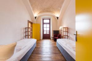 Posteľ alebo postele v izbe v ubytovaní HolidayPark Mlázovy