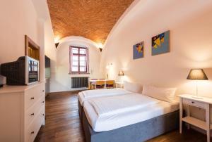 Posteľ alebo postele v izbe v ubytovaní HolidayPark Mlázovy