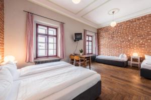 Posteľ alebo postele v izbe v ubytovaní HolidayPark Mlázovy