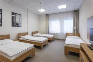Postel nebo postele na pokoji v ubytování Sareza hotel