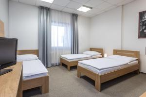 Postel nebo postele na pokoji v ubytování Sareza hotel