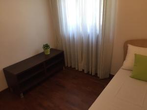 Posteľ alebo postele v izbe v ubytovaní La Villa Del Cedro