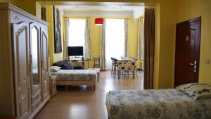 Postel nebo postele na pokoji v ubytování Apartments Marco Polo Midi