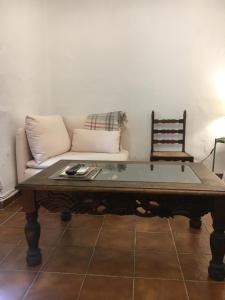 Posezení v ubytování La casita de la ciudad