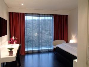Ένα ή περισσότερα κρεβάτια σε δωμάτιο στο Forenom Aparthotel Gothenburg Nolvik