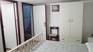 A bed or beds in a room at Villa Aquarium