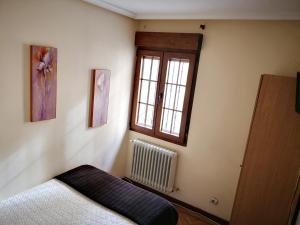 Postel nebo postele na pokoji v ubytování Hostal Alcántara