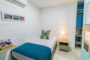 מיטה או מיטות בחדר ב-Hotel Casa Vallecaucana