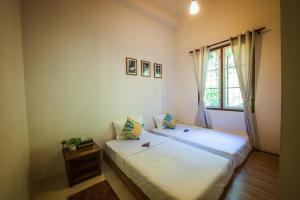 Katil atau katil-katil dalam bilik di Rest Pause Rainforest Retreat