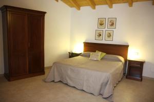 A bed or beds in a room at Gli Acini