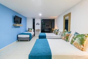 TV a/nebo společenská místnost v ubytování Hotel Casa Vallecaucana