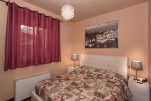 Posteľ alebo postele v izbe v ubytovaní Hotel Il Giardino