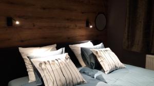 Letto o letti in una camera di "Un matin au jardin"