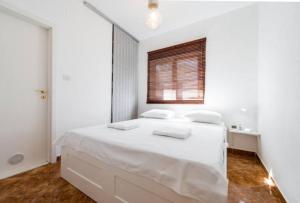 Posteľ alebo postele v izbe v ubytovaní Villa Paradise Regained
