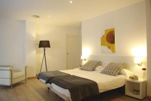 Posteľ alebo postele v izbe v ubytovaní 08028 Apartments