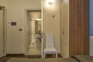 Koupelna v ubytování Hotel Il Giardino + 37 fotografií