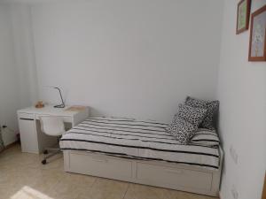 Apartamento Puertoにあるベッド