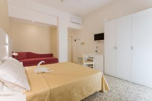 TV a/nebo společenská místnost v ubytování Sirena Boutique Hotel