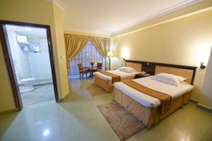 Postel nebo postele na pokoji v ubytování Hotel Sojovalo