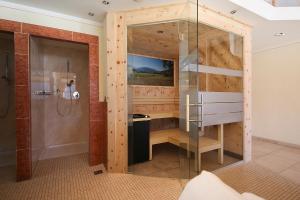 Ένα ή περισσότερα κρεβάτια σε δωμάτιο στο Hotel Gasthof Neuner