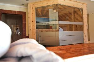 Ένα ή περισσότερα κρεβάτια σε δωμάτιο στο Hotel Gasthof Neuner