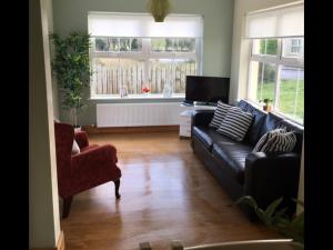 Posezení v ubytování No 4 Ballymastoker Cottage + 5 fotografií