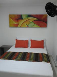 Ένα ή περισσότερα κρεβάτια σε δωμάτιο στο Hotel Pereira 421