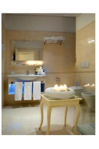 Ванна кімната в Villaggio San Giovanni